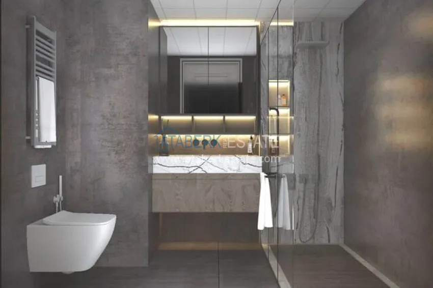 Приобрести Отличное предложение для тех, кто хотел бы приобрести новый проект всего в 500 метрах от моря в городе Мерсин. 10 