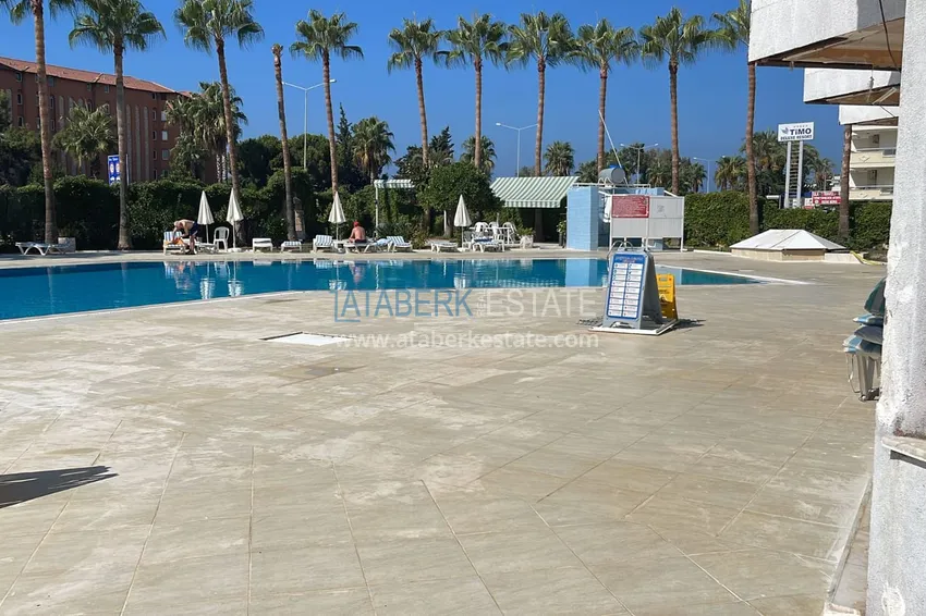 Квартира у моря с двумя спальнями и отдельной кухней в районе Конаклы, Алания 3 