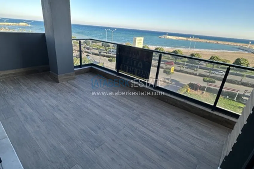 Приобрести Небольшой жилой комплекс в самом сердце Эрдемли, расположенный прямо у моря. 12 