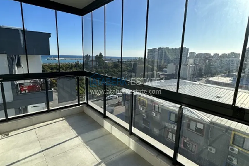 Приобрести Готовые квартиры 2+1 с чистовой отделкой в 100 м от моря, в популярном районе Эрдемли-Мерсин 13