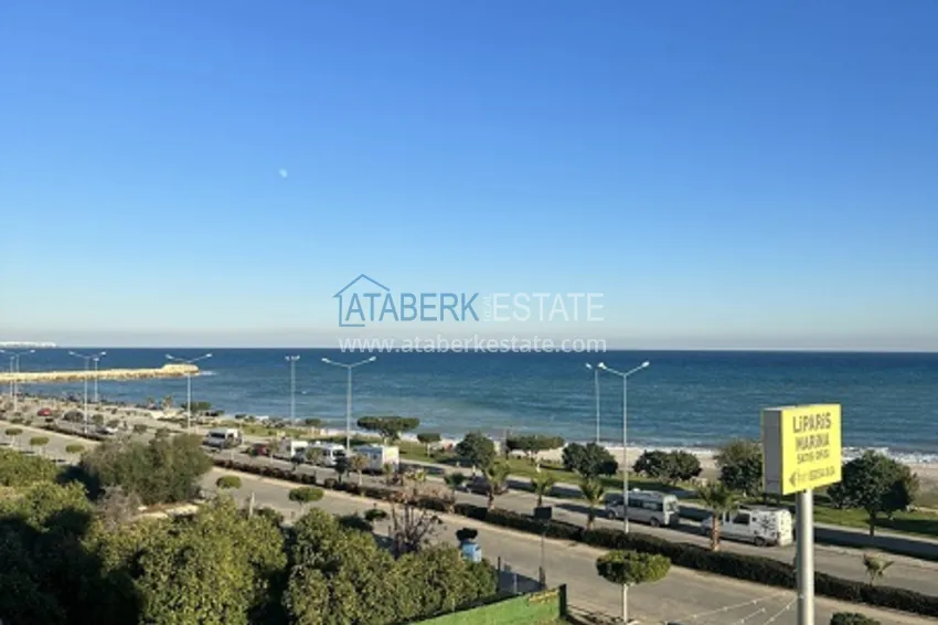 Приобрести Небольшой жилой комплекс в самом сердце Эрдемли, расположенный прямо у моря. 14 