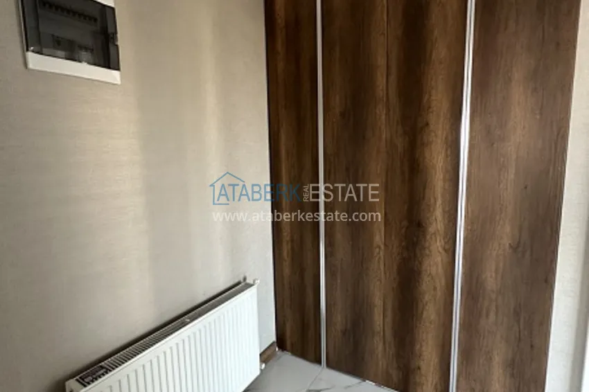 Приобрести Небольшой жилой комплекс в самом сердце Эрдемли, расположенный прямо у моря. 11 