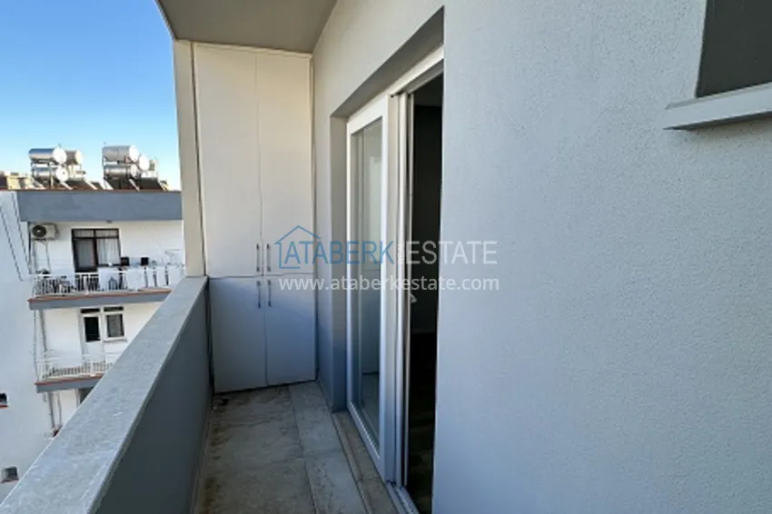 Приобрести Готовые квартиры 2+1 с чистовой отделкой в 100 м от моря, в популярном районе Эрдемли-Мерсин 15