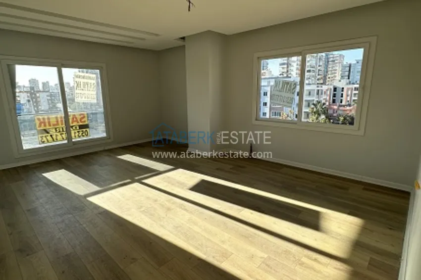 Приобрести Готовые квартиры 2+1 с чистовой отделкой в 100 м от моря, в популярном районе Эрдемли-Мерсин 1