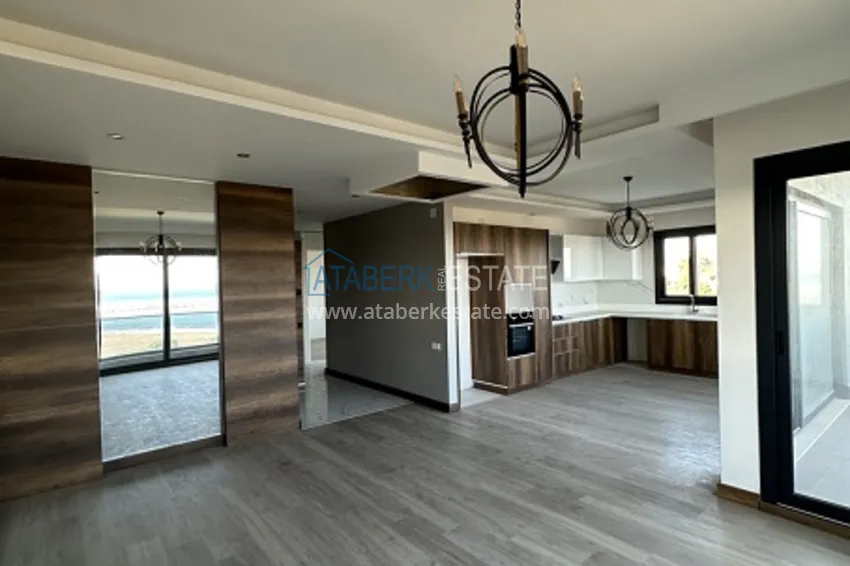 Приобрести Небольшой жилой комплекс в самом сердце Эрдемли, расположенный прямо у моря. 2 