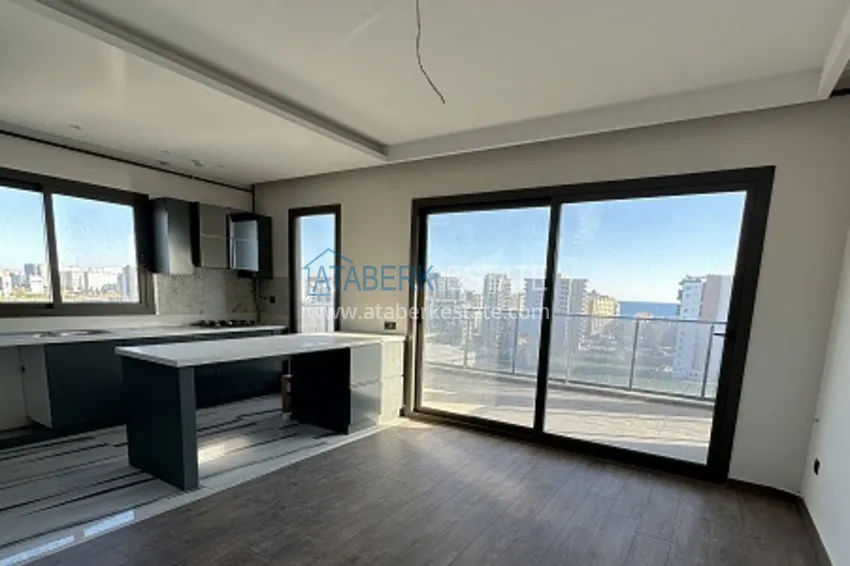 Квартиры 4+1 с чистовой отделкой в новом жилом комплексе в районе Арпачбахшиш, Мерсин 1 