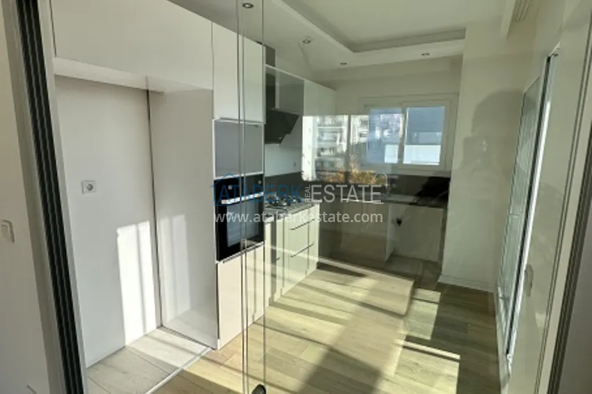 Приобрести Готовые квартиры 2+1 с чистовой отделкой в 100 м от моря, в популярном районе Эрдемли-Мерсин 7