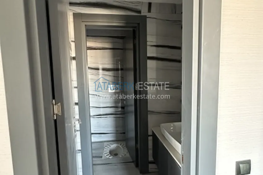 Приобрести Квартиры 4+1 с чистовой отделкой в новом жилом комплексе в районе Арпачбахшиш, Мерсин 10 