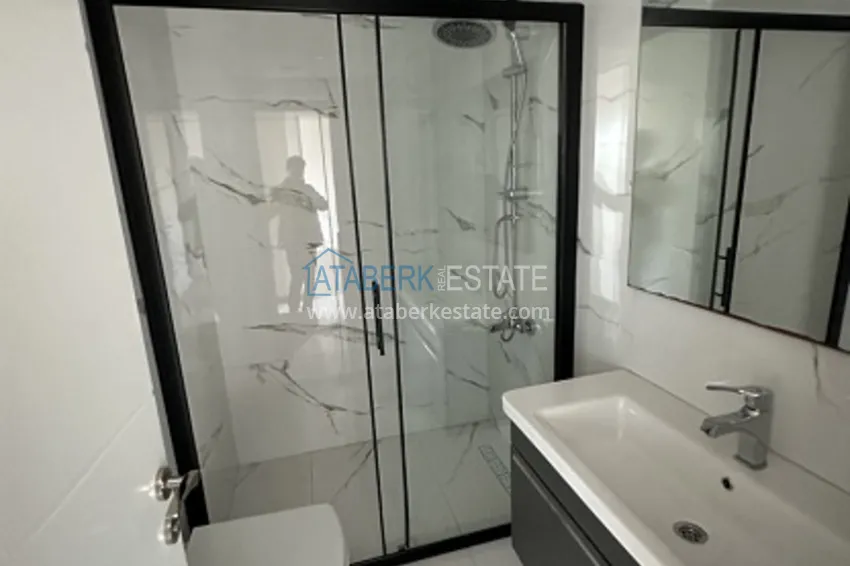 Приобрести Небольшой жилой комплекс в самом сердце Эрдемли, расположенный прямо у моря. 9 