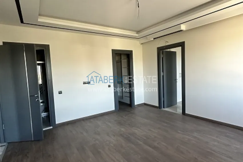 Приобрести Квартиры 4+1 с чистовой отделкой в новом жилом комплексе в районе Арпачбахшиш, Мерсин 5 