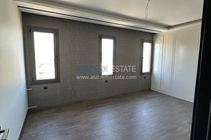 Приобрести Квартиры 4+1 с чистовой отделкой в новом жилом комплексе в районе Арпачбахшиш, Мерсин 6 