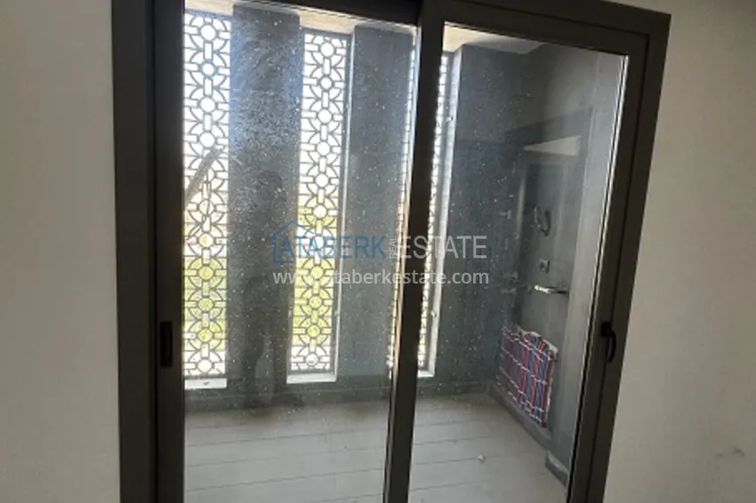 Приобрести Квартиры 4+1 с чистовой отделкой в новом жилом комплексе в районе Арпачбахшиш, Мерсин 14 