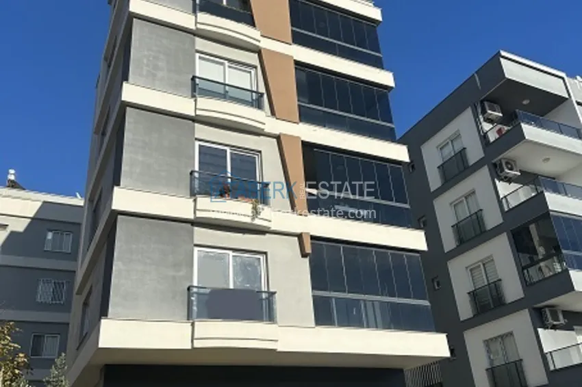 Готовые квартиры 2+1 с чистовой отделкой в 100 м от моря, в популярном районе Эрдемли-Мерсин 1