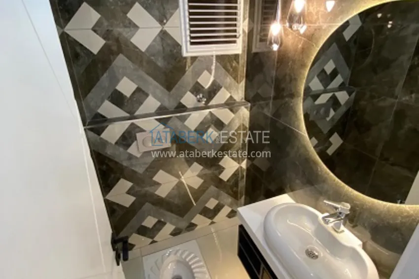 Приобрести Апартаменты 4+1 с чистовой отделкой в микрорайоне Соли города Мерсин 13 