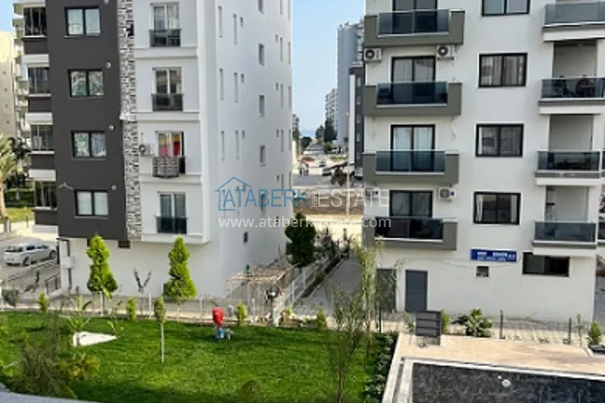 Приобрести Квартира 2+1 с чистовой отделкой по цене от застройщика, район Тедже в городе Мерсине 14 