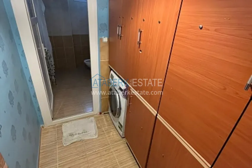 Приобрести Квартира 2+1 с мебелью и отдельной кухней в районе Эрдемли-Томюк 9 