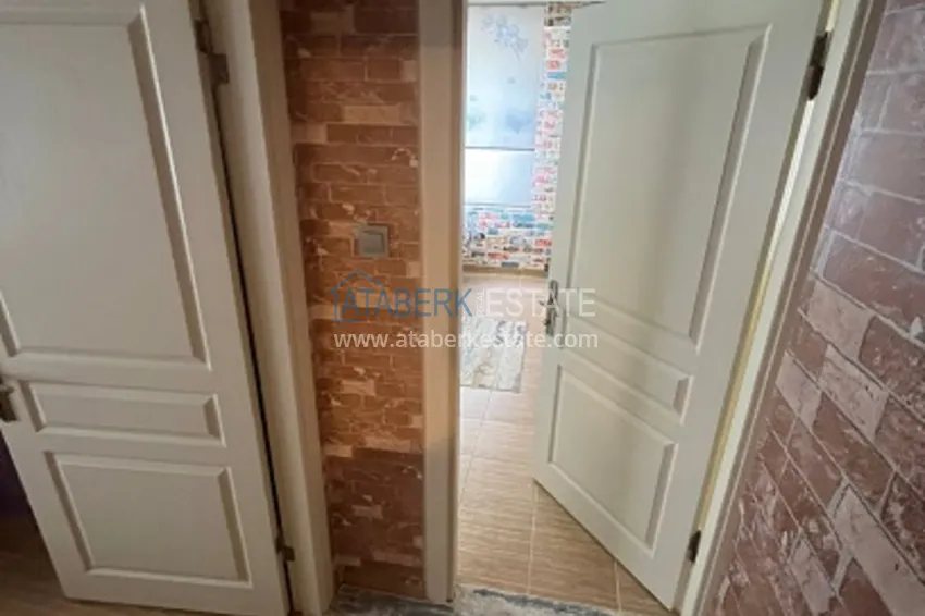 Приобрести Квартира 2+1 с мебелью и отдельной кухней в районе Эрдемли-Томюк 11 