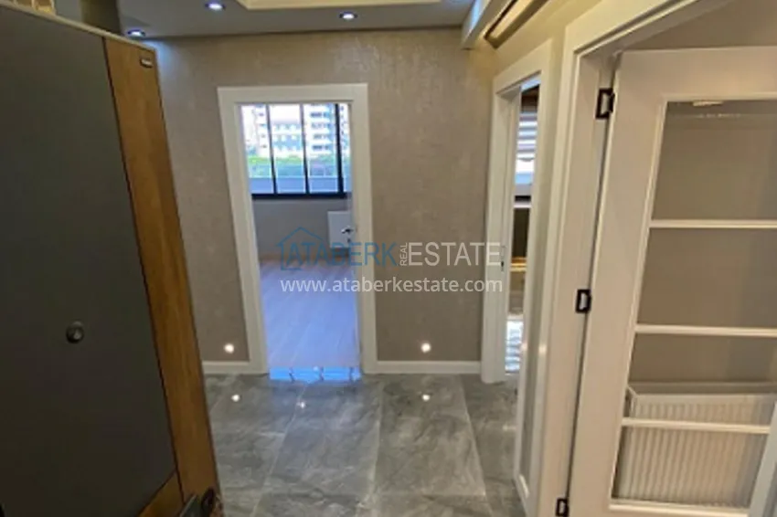 Приобрести Апартаменты 4+1 с чистовой отделкой в микрорайоне Соли города Мерсин 12 