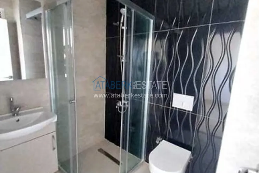 Приобрести Квартиры 4+1 с чистовой отделкой в новостройке в Эрдемли-Мерсин. 18 