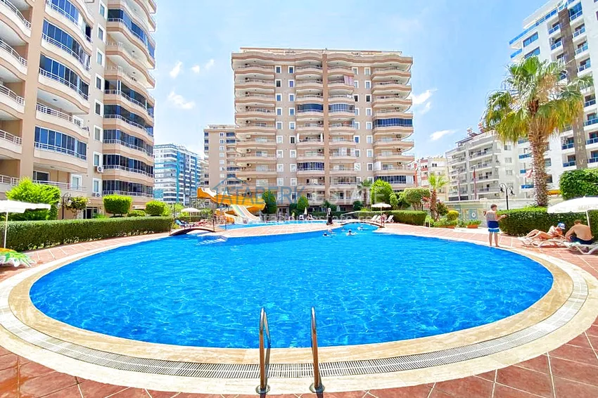 Пентхаус-дуплекс 3+1 в Махмутларе с мебелью, застекленным балконом и видом на море 1 