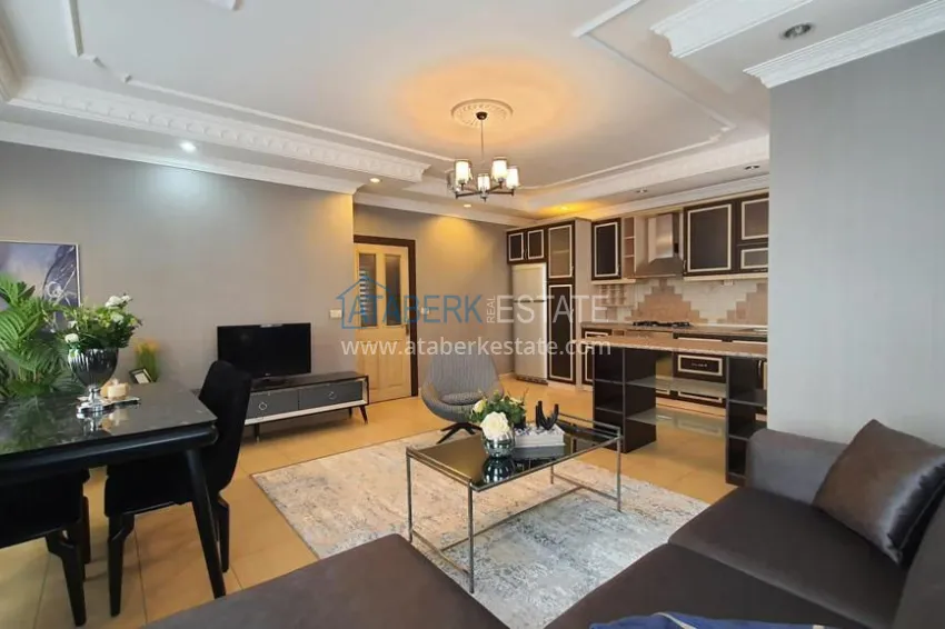 Приобрести Квартира 2+1 в центре Алании с новой современной мебелью и открытым видом из окна. Недвижимость подходит для ВНЖ 3 