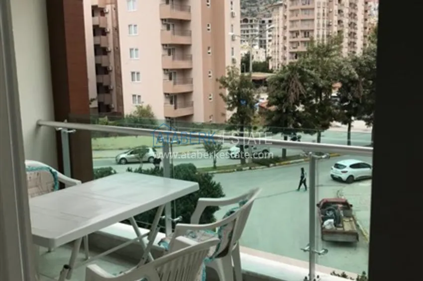 Приобрести Квартира 1+1 меблированная с видом на горы, центр Алании район пляжа Клеопатра 10 