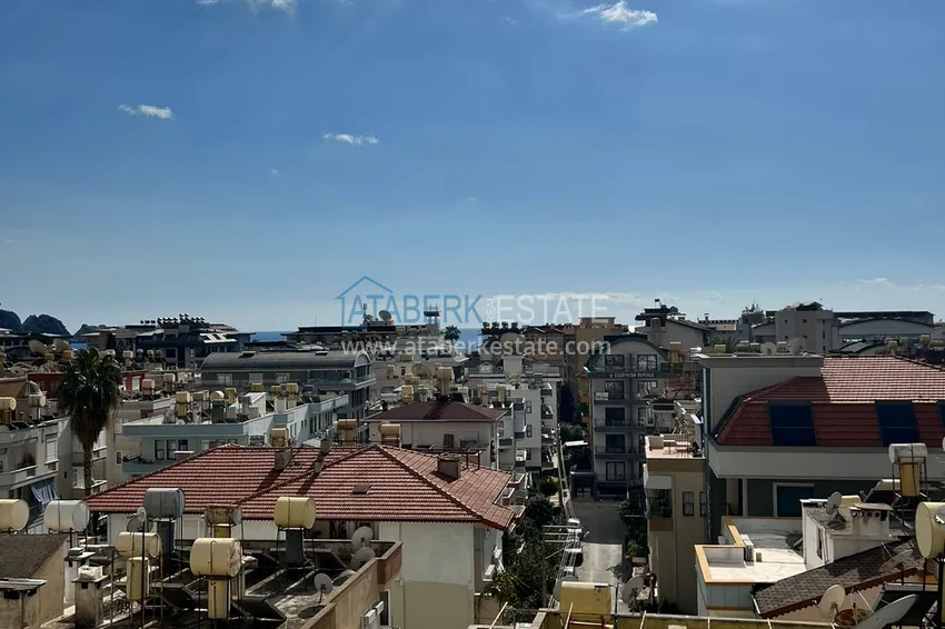 Приобрести Огромная двухкомнатная квартира с мебелью в центре Алании, район пляжа Клеопатра 10 