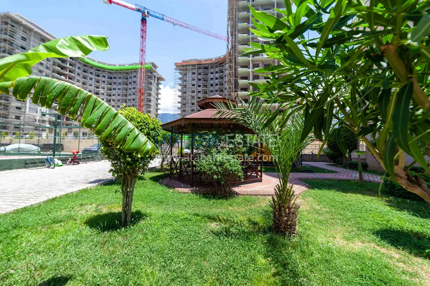 Пентхаус-дуплекс 3+1 в Махмутларе с мебелью, застекленным балконом и видом на море 12 