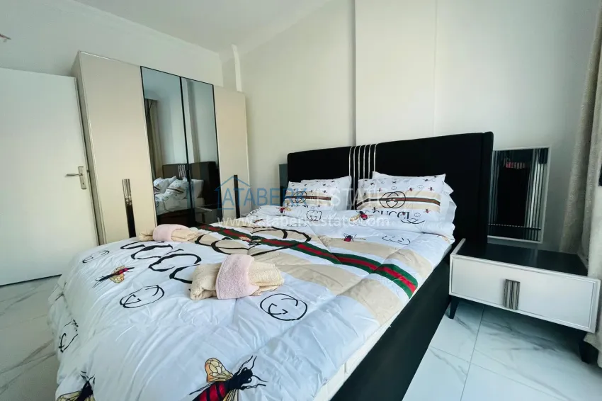 Приобрести Квартира 1+1 в Махмутларе с новой мебелью в молодом комплексе 11 