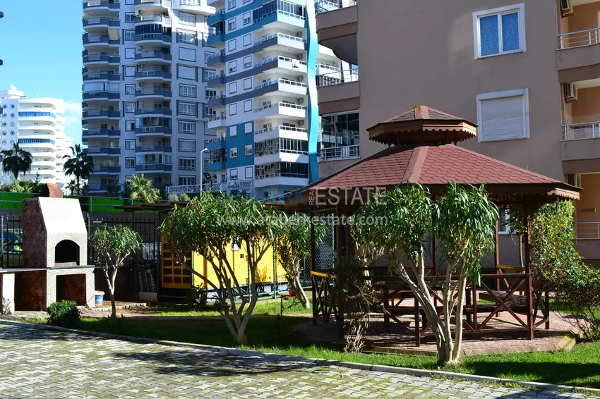 Пентхаус-дуплекс 3+1 в Махмутларе с мебелью, застекленным балконом и видом на море 13 