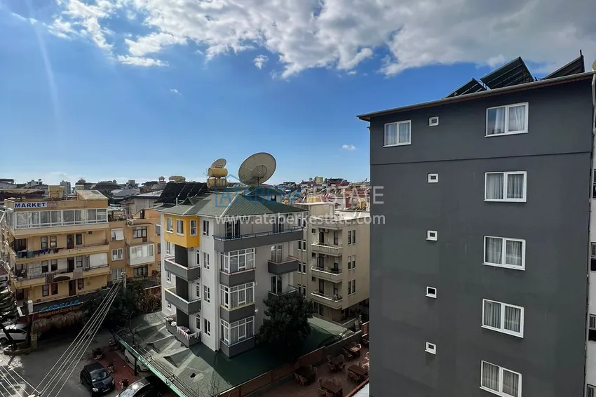 Приобрести Огромная двухкомнатная квартира с мебелью в центре Алании, район пляжа Клеопатра 12 