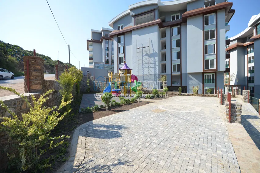 Квартира 1+1 с боковым видом на море в элитном комплексе с частным пляжем, Каргыджак – Алания 14 