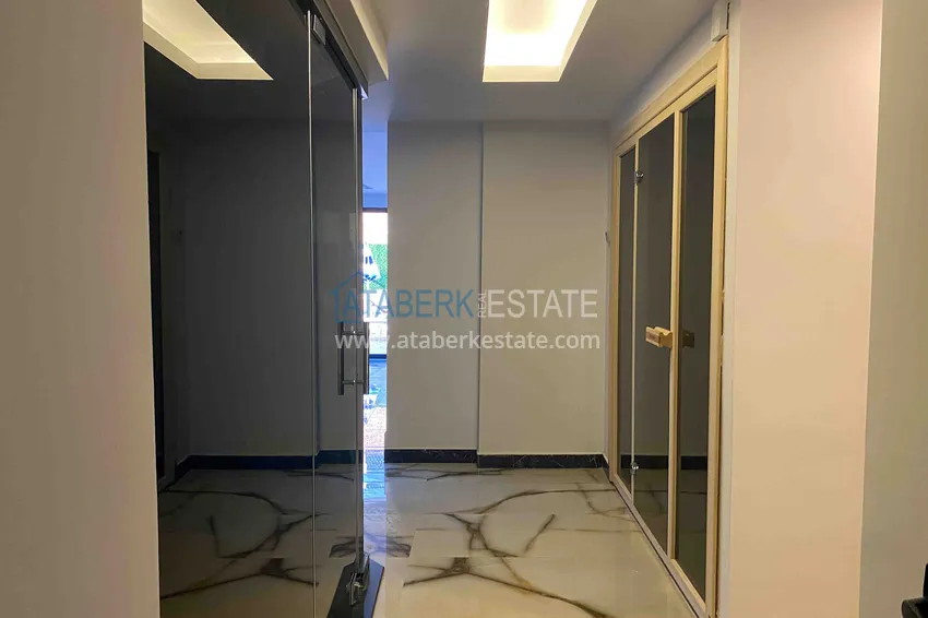 Квартира 1+1 с новой мебелью и видом на горы в Алании район Махмутлар 11 