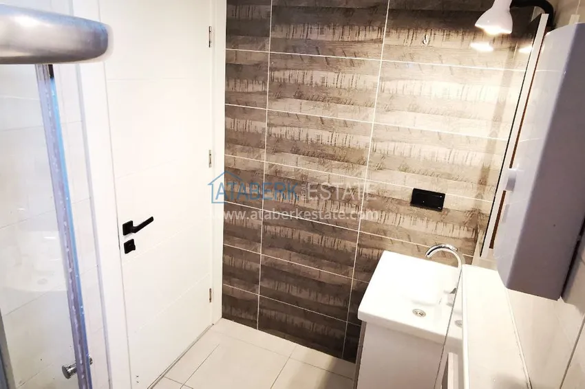 Приобрести Квартира 1+1 с новой мебелью и видом на горы в Алании район Махмутлар 13 