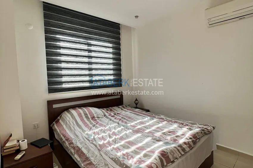 Приобрести Огромная двухкомнатная квартира с мебелью в центре Алании, район пляжа Клеопатра 13 