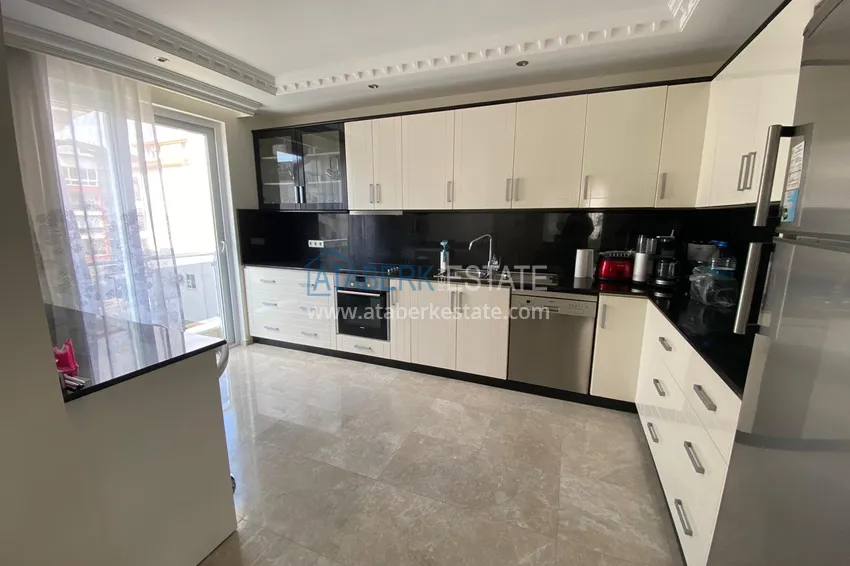 Приобрести Квартира 3+1 меблированная с видом на море и горы в комплексе на первой береговой, Кестель – Алания 13