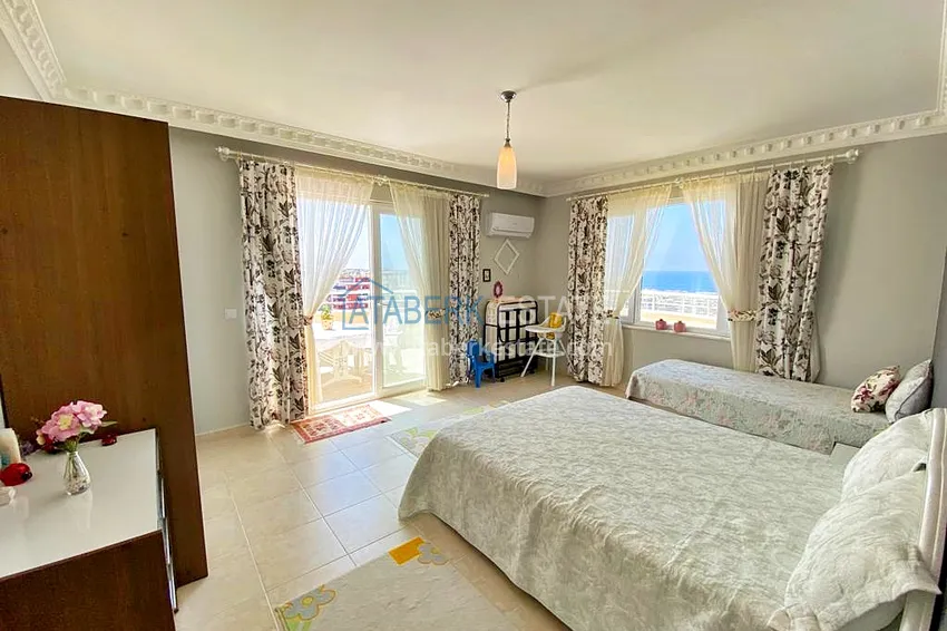 Приобрести Пентхаус-дуплекс 3+1 в Махмутларе с мебелью, застекленным балконом и видом на море 14 