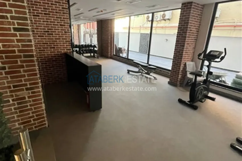 Квартира 1+1 в новом комплексе сегмента премиум на первой береговой линии в районе Оба 14 