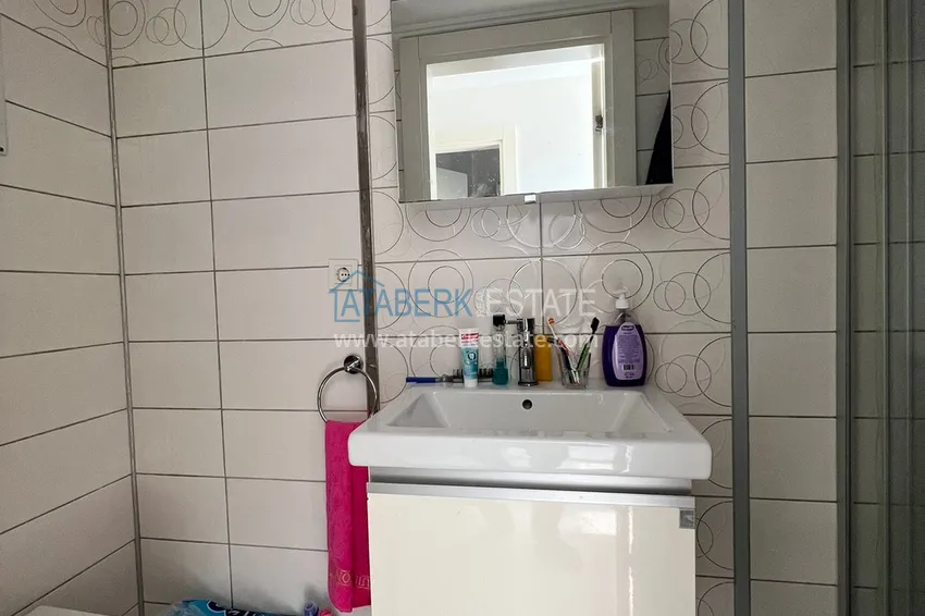 Приобрести Огромная двухкомнатная квартира с мебелью в центре Алании, район пляжа Клеопатра 14 