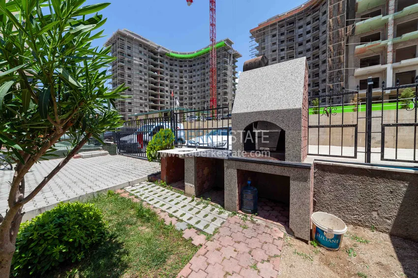 Пентхаус-дуплекс 3+1 в Махмутларе с мебелью, застекленным балконом и видом на море 16 