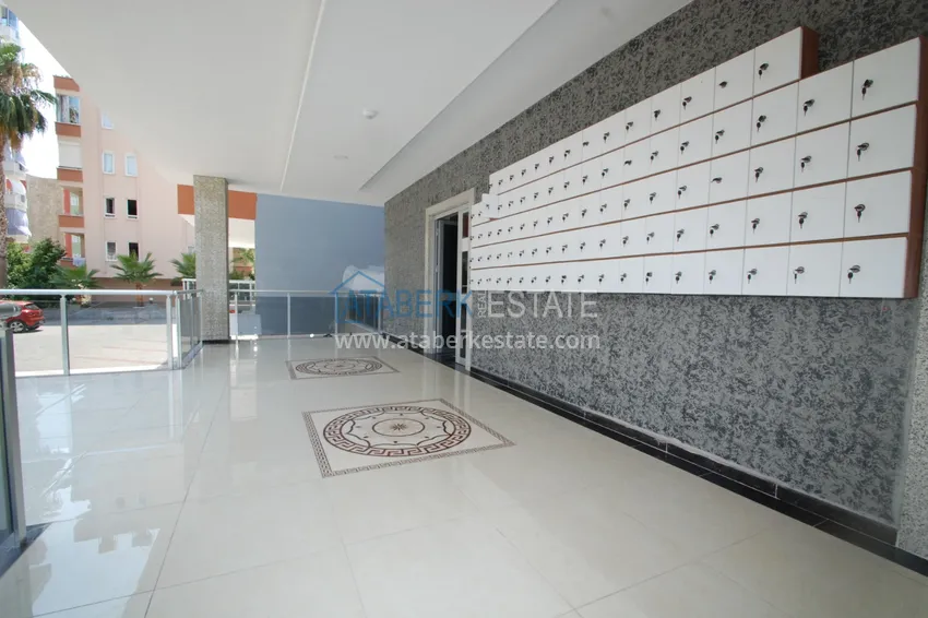 Просторная двухкомнатная квартира с тремя застеклёнными балконами в Алании, район Махмутлар 16 