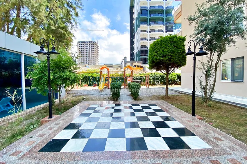 Пентхаус-дуплекс 3+1 в Махмутларе с мебелью, застекленным балконом и видом на море 20 