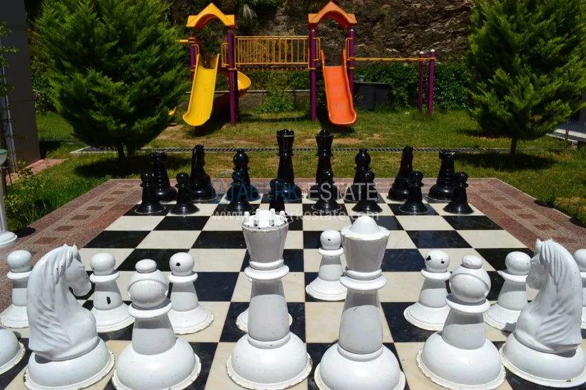 Пентхаус-дуплекс 3+1 в Махмутларе с мебелью, застекленным балконом и видом на море 21 