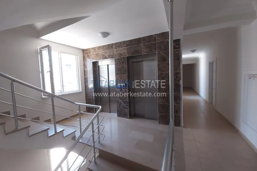 Просторная двухкомнатная квартира с тремя застеклёнными балконами в Алании, район Махмутлар 17 