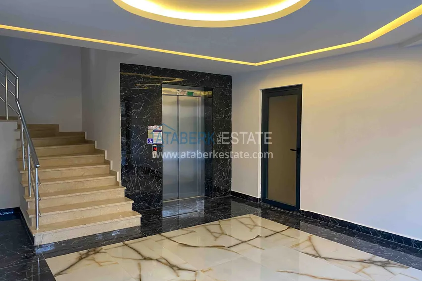 Квартира 1+1 с новой мебелью и видом на горы в Алании район Махмутлар 15 