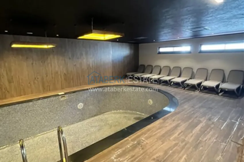 Квартира 1+1 в новом комплексе сегмента премиум на первой береговой линии в районе Оба 16 