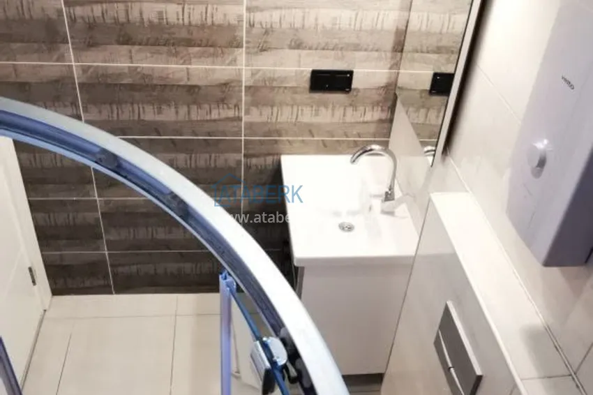 Приобрести Квартира 1+1 с новой мебелью и видом на горы в Алании район Махмутлар 17 