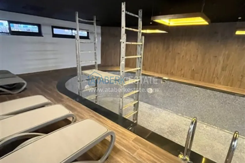 Квартира 1+1 в новом комплексе сегмента премиум на первой береговой линии в районе Оба 17 