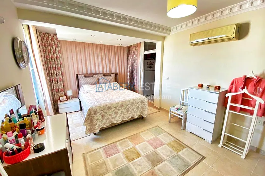 Приобрести Пентхаус-дуплекс 3+1 в Махмутларе с мебелью, застекленным балконом и видом на море 17 