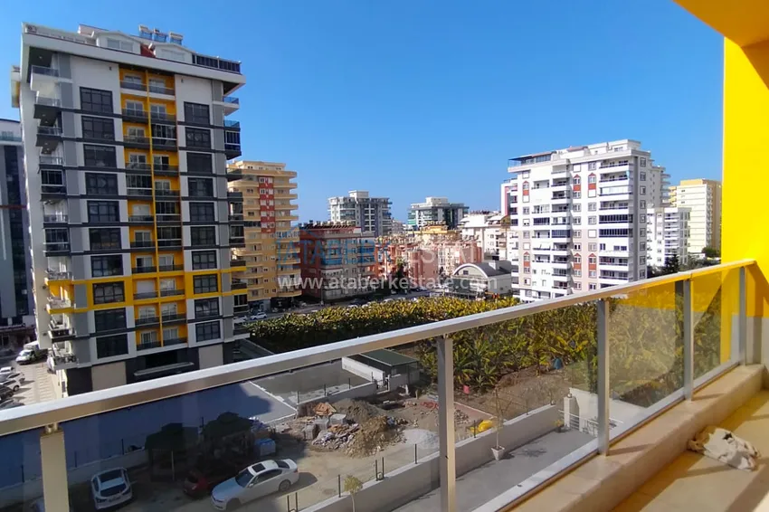 Приобрести Квартира 3+1 частично меблированная с отдельной кухней, район Махмутлар – Алания 19 